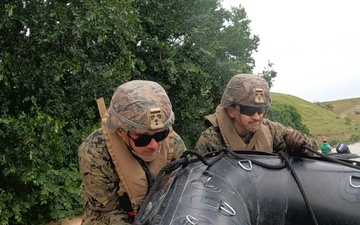 U.S. Marines and Romanian forces conduct combat rubber raiding craft operations in Romania