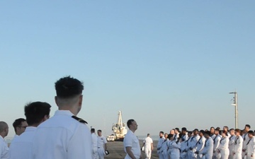 Sailors Man the Rails in New York Harbor