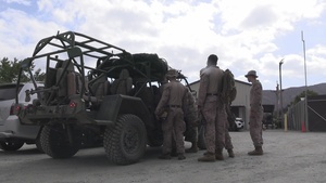Marines attached to JTF-SB practice driving off-road into harsh terrain