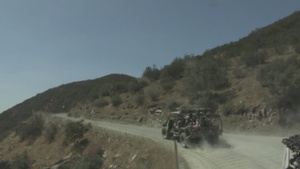 Marines attached to JTF-SB practice driving off-road into harsh terrain