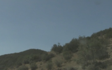 Marines attached to JTF-SB practice driving off-road into harsh terrain
