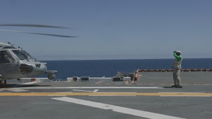 MV-22B Ospreys and MH-60 Seahawk execute embarkation procedures on USS Makin Island | B-Roll