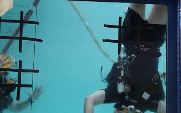Rear Adm. Andros Dives in the U.S. Navy Dive Tank in Times Square
