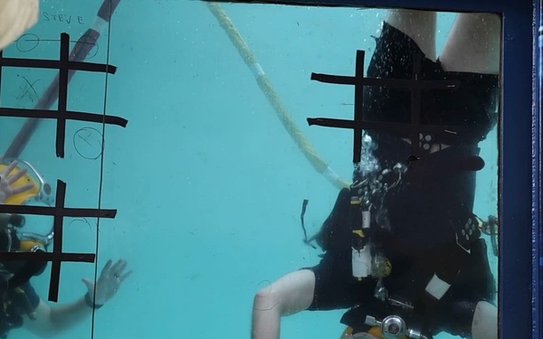 Rear Adm. Andros Dives in the U.S. Navy Dive Tank in Times Square