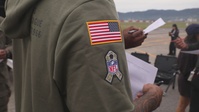Current and former Atlanta Falcon members visit MCAS Iwakuni during a Salute the