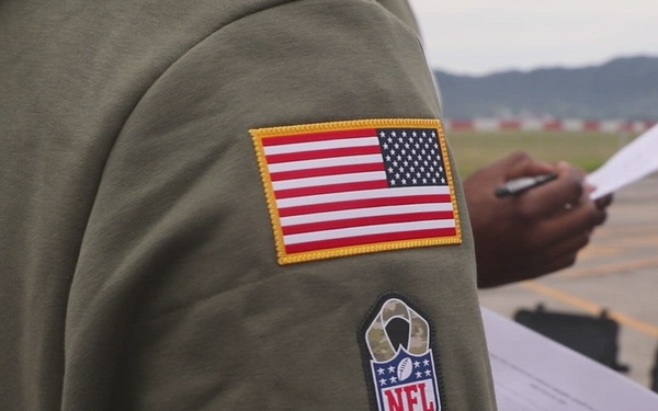 Current and former Atlanta Falcon members visit MCAS Iwakuni during a Salute the