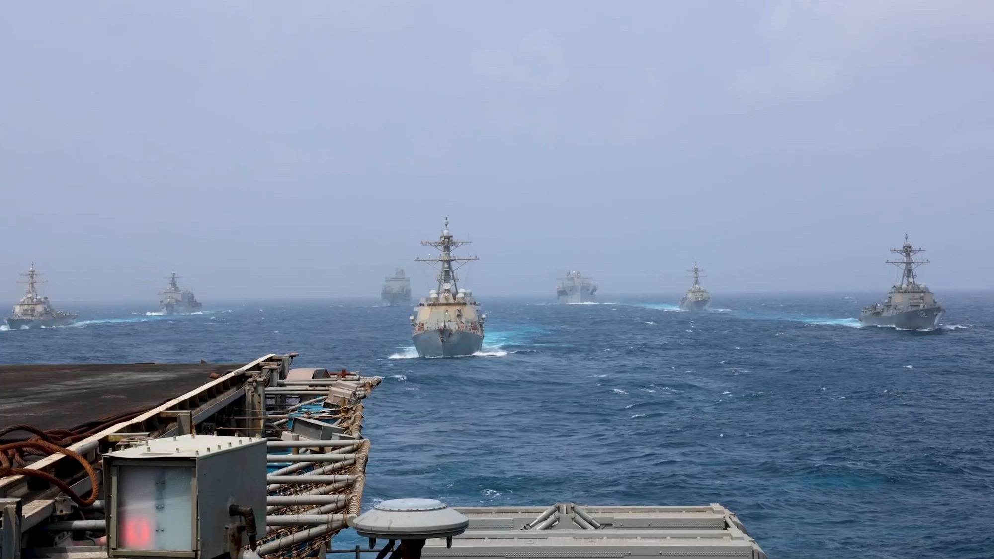 U.S. Navy warships and aircraft transit the Arabian Sea in close formation as CENTCOM forces continue to promote regional security and stability, June 30, 2026. (U.S. Navy video)