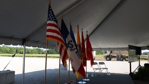 Flags lined up in preparation for the groundbreaking ceremony for the new Future Artillery Complex at Iowa Army Ammunition Plant.