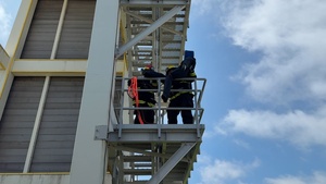 Firefighters conduct rescue training at Torii Station