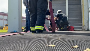 Firefighters conduct rescue training at Torii Station
