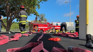 Firefighters conduct rescue training at Torii Station