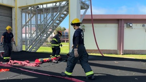 Firefighters conduct rescue training at Torii Station