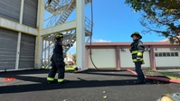Firefighters conduct rescue training at Torii Station