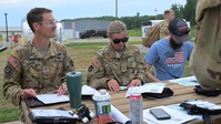 B-roll Video of Minnesota National Guard mobilized during aerial wildfire suppression operations at Orr Regional Airport