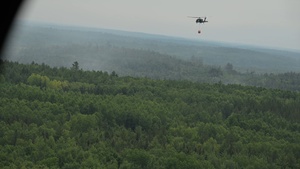 B-roll Video of Minnesota National Guard mobilized during aerial wildfire suppression operations at Orr Regional Airport