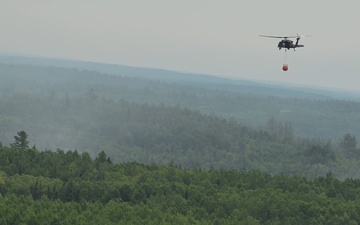 B-roll Video of Minnesota National Guard mobilized during aerial wildfire suppression operations at Orr Regional Airport