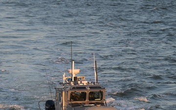 U.S. Coast Guard and Navy crews conduct helicopter training aboard Spirit of Norfolk