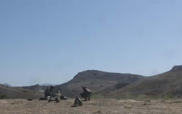 1st MLG Marines conduct a machine gun range