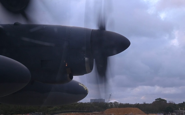 AFSOC MC-130J conducts nighttime air drops