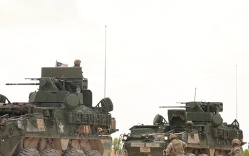 Spc. Harris, assigned to 6-56 ADAR, Conducts Maintenance on a Stryker,