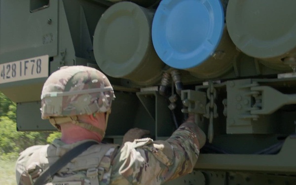 MOS 13M Multiple Launch Rocket System (MLRS/HIMARS) Crewmember-United States Army Military Occupational Specialty-HIMARS Loading Field