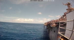 B-Roll: Decommissioned USS Peleliu struck by Harpoon anti-ship cruise missiles during RIMPAC 26 sinking exercise