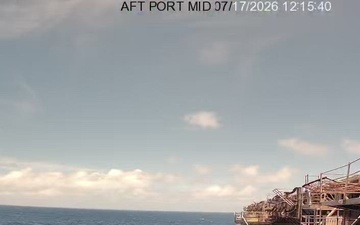 B-Roll: Decommissioned USS Peleliu struck by Harpoon anti-ship cruise missiles during RIMPAC 26 sinking exercise