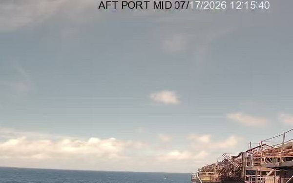 B-Roll: Decommissioned USS Peleliu struck by Harpoon anti-ship cruise missiles during RIMPAC 26 sinking exercise
