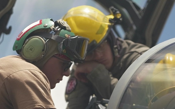 B-Roll: U.S. Navy Sailors arms F/A-18 Hornets for sinking exercise during RIMPAC 2026