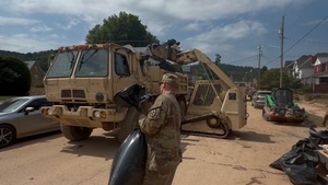 B-Roll: The 1092nd Engineer Battalion provides loader dump teams and  heavy equipment during flood debris removal operations in Weston, WV