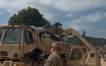 B-Roll: The 1092nd Engineer Battalion provides loader dump teams and  heavy equipment during flood debris removal operations in Weston, WV