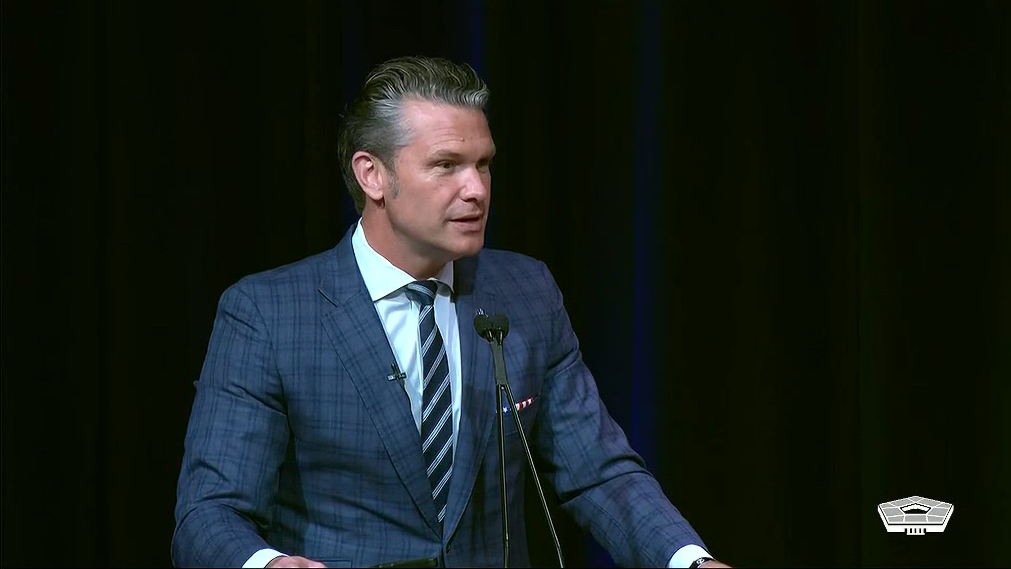 Secretary of War Pete Hegseth presents the Mexican Border Defense Medal to service members during a ceremony at the Pentagon, July 27, 2026.