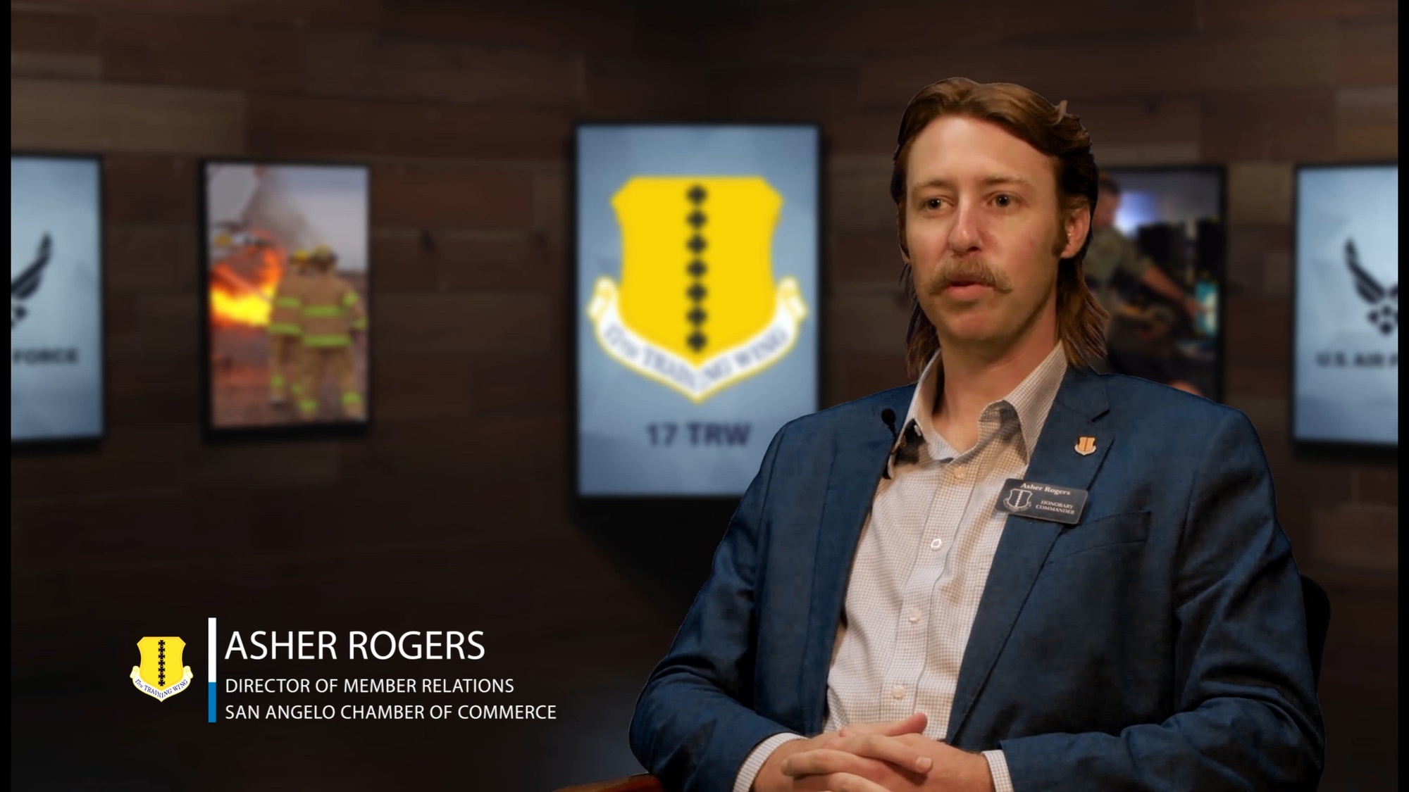 Asher Rogers, 17th Training Wing Honorary Commander, speaks about his experiences while a part of the program.
