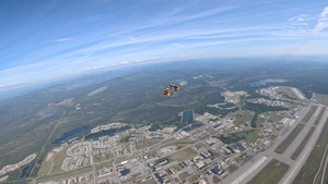 The U.S. Army Parachute Team jumps for Arctic Lightning Open House