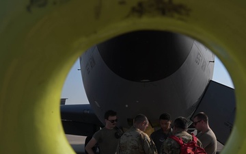 KC135 refuels F16s during routine patrol
