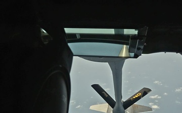 KC-135 refuels F-16 for theater stability