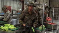 U.S. Marine with 2nd Bn., 1st Marines, speaks on food service specialists