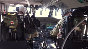 Oregon Guard HH-60 crew drops water on Hagen Fire