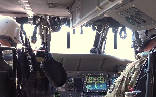 Oregon Guard HH-60 crew drops water on Hagen Fire