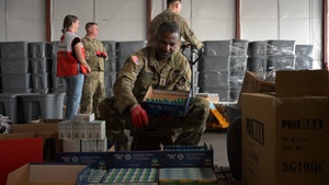 194th Wing Airmen assist the Red Cross with wildfire relief packages