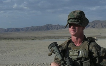 U.S. Marine with 2nd Bn., 1st Marines, speaks about squad-level operations during AFX