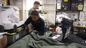 Marines Repair Flight Suit