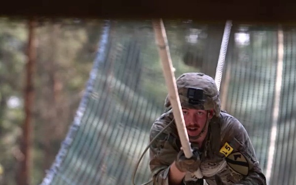Spc. Cristopher Curiel of 1st Cavalry Division discusses the Best Squad Competition