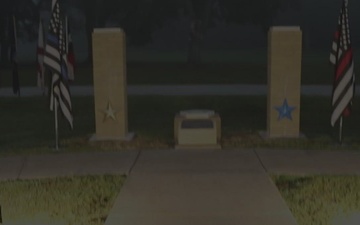 The Rock Island Arsenal 9/11 Memorial illuminated