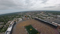 Michigan native on U.S. Army Parachute Team flies parachute to land at Michigan Stadium