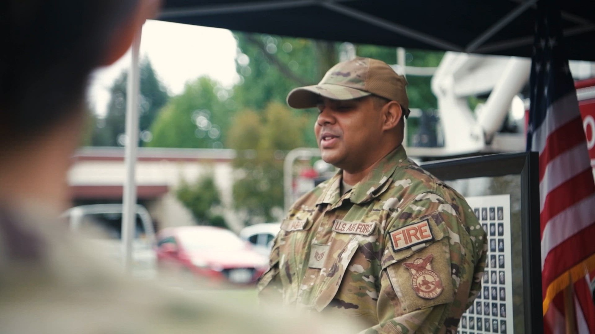 U.S. Air Force Col. Henry Pflugradt, 374th Operations Group commander, addresses members of Team Yokota during a speech at the 9/11 Memorial Tower Run event at Yokota Air Base.