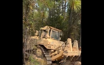 Arkansas National Guard Bulldozers Clear the Path