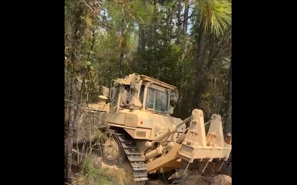 Arkansas National Guard Bulldozers Clear the Path