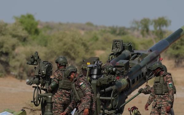 U.S., Indian Army Soldiers exchange artillery techniques during M777 live fire at Yudh Abhyas 2026