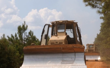 Arkansas Army National Guard Dozers prevent Bunker Fire from spreading